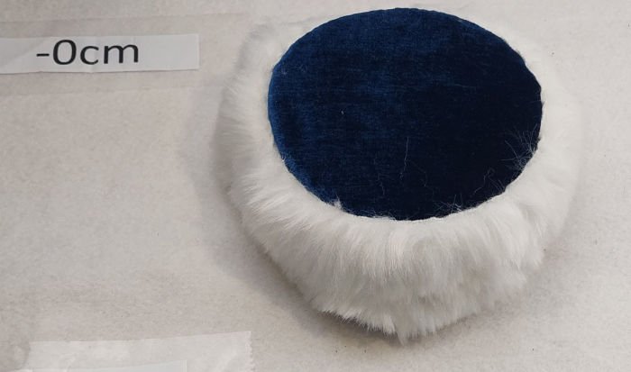 WHITE AND NAVY FAUX FUR HAT WITH ELASTIC
