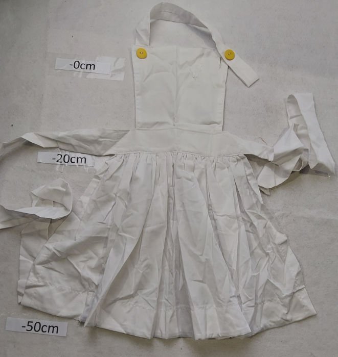 FULL WHITE APRON WITH YELLOW BUTTONS
